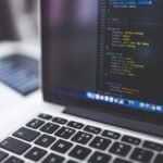 Laptop screen showing coding - Technical Lead Full Stack AI job at Sapphire Consulting Services